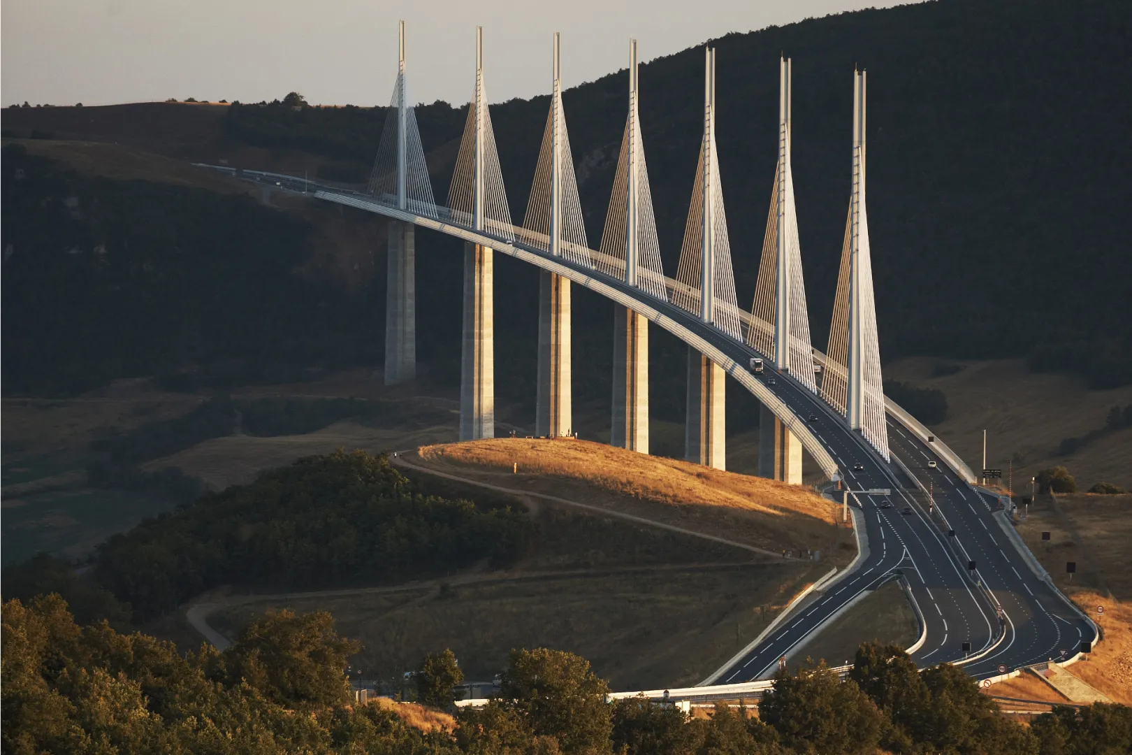 Millau Viaduct soaring over Tarn valley with deep drop and blue sky